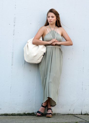 Pale green reversible dress tied behind neck Model is wearing palegreen reversible midi dress tied behind neck