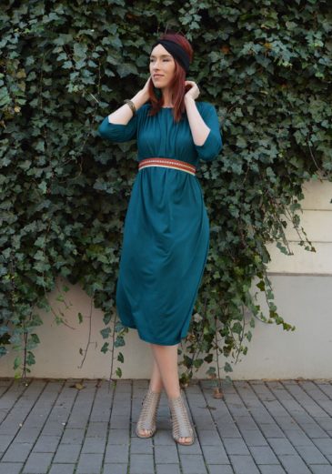 Reversible emerald midi dress with three quarter sleeves Model is wearing reversible emerald midi dress with two sleeves